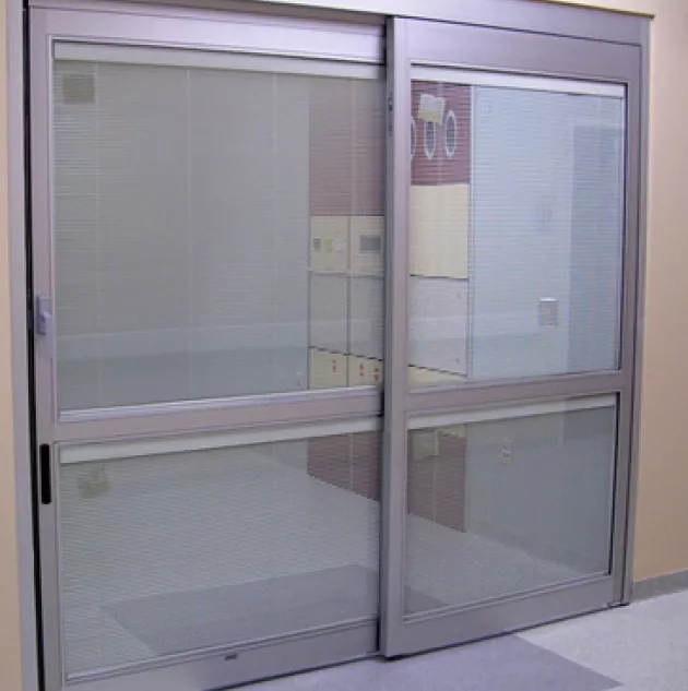 A set of doors in a hospital room.