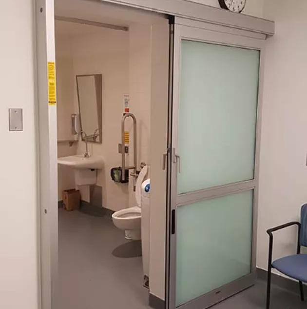 A set of doors in a hospital room.